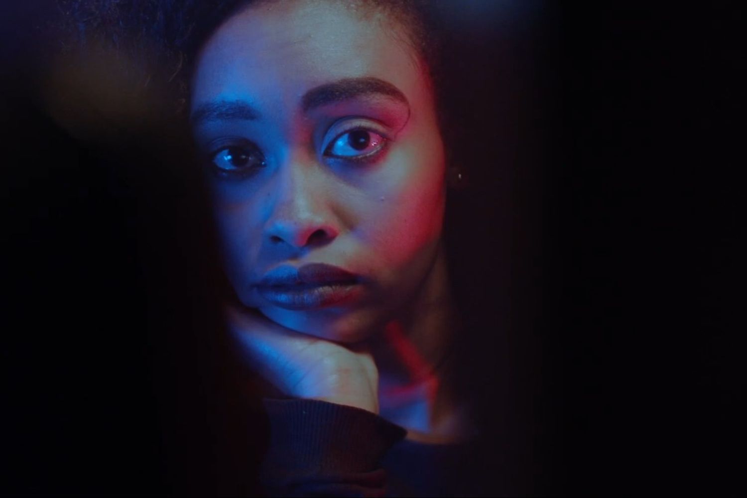 Still Waters ,Mika looking at the . cinematic. short filmcomputer screen contemplatively. cinematic. cinematic. short film